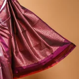 Pallu of Burgundy Kanjeevaram Saree with whimsical Copper and Silver Zari stripes