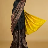 Dreamy Black Kanjeevaram saree with contrasting Yellow blouse and pallu