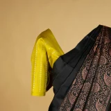 Dreamy Black Kanjeevaram saree with contrasting Yellow blouse and pallu