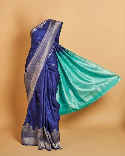 Blue Kanjeevaram saree with Silver zari and contrasting pallu